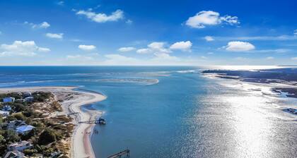 Poolside Tiki bar with swings! Heated pool! See boardwalk to beach from lawn!