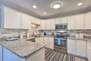 Fridge, microwave, coffee/tea maker, high chair