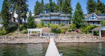 Lakefront Home with a Private Dock, Fireplace, Dance Studio, & Mountain Views