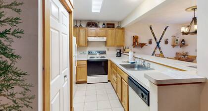 Tree-lined townhome with private deck - close to skiing & waterpark