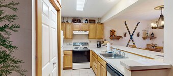 Tree-lined townhome with private deck - close to skiing & waterpark