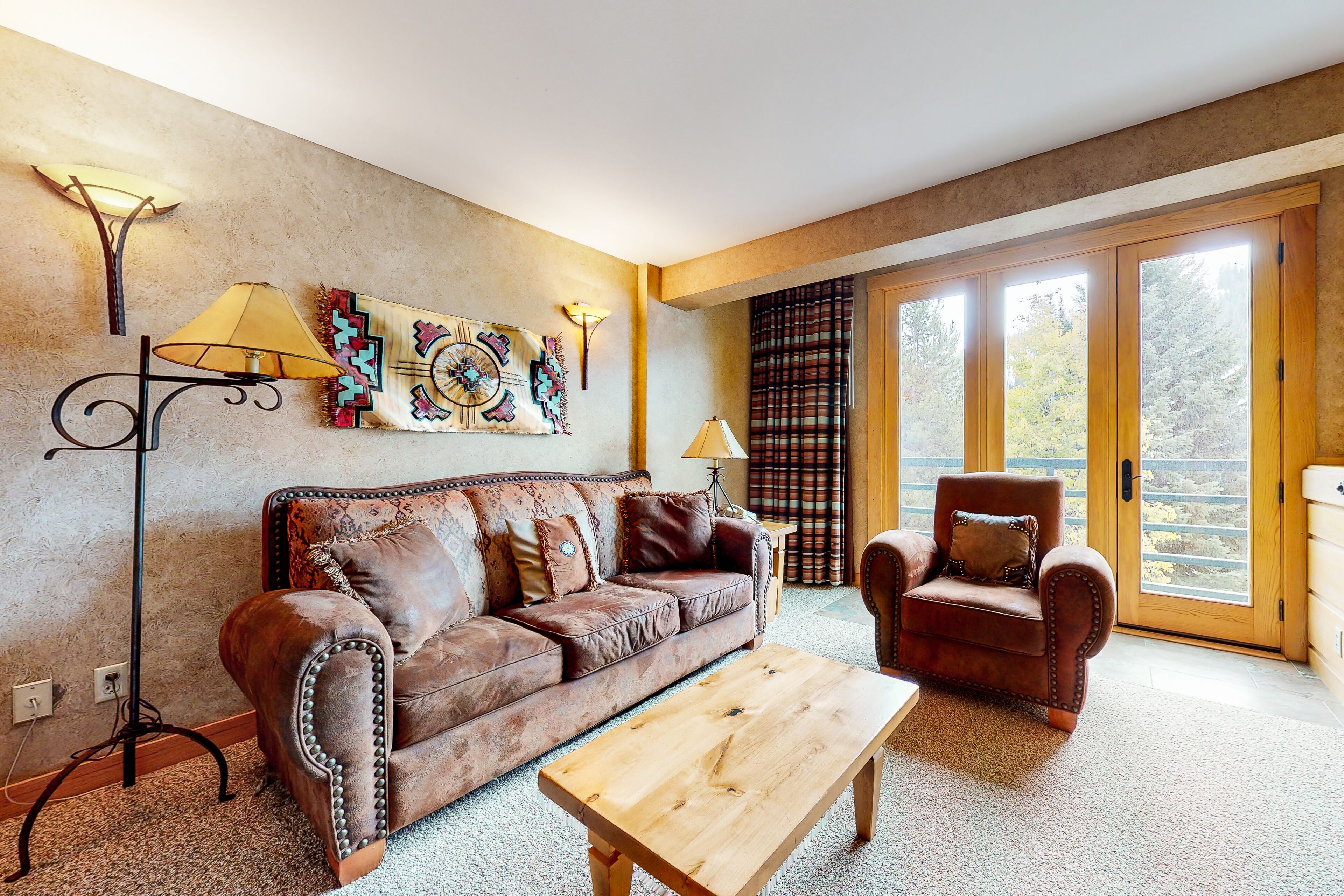 Ski-in/out condo with mountain view, hot tub, pool, gym & sauna