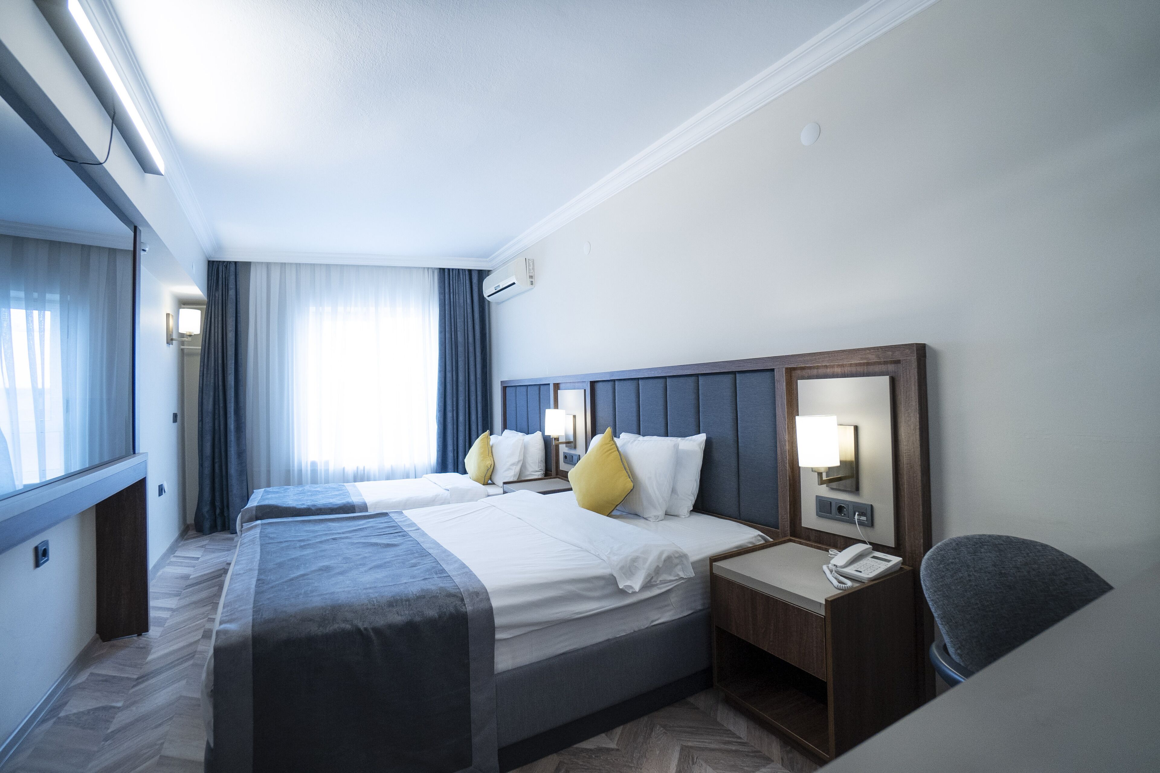 family room | free minibar, in-room safe, individually decorated