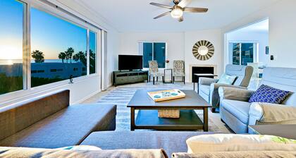 Sunny condo with gorgeous ocean & pier views & covered parking - walk to beach
