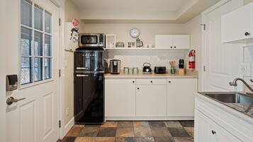 Fridge, microwave, coffee/tea maker, toaster