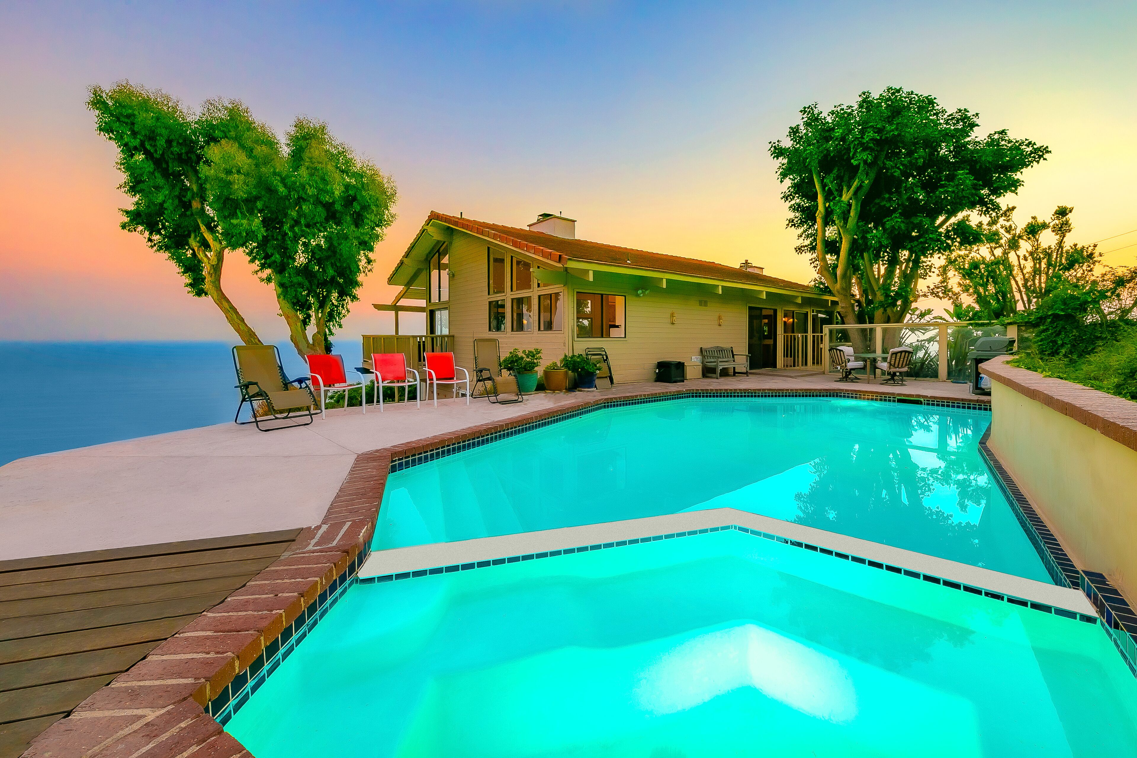 Ocean-view dog-friendly house with pool, hot tub, & sauna - snowbirds welcome