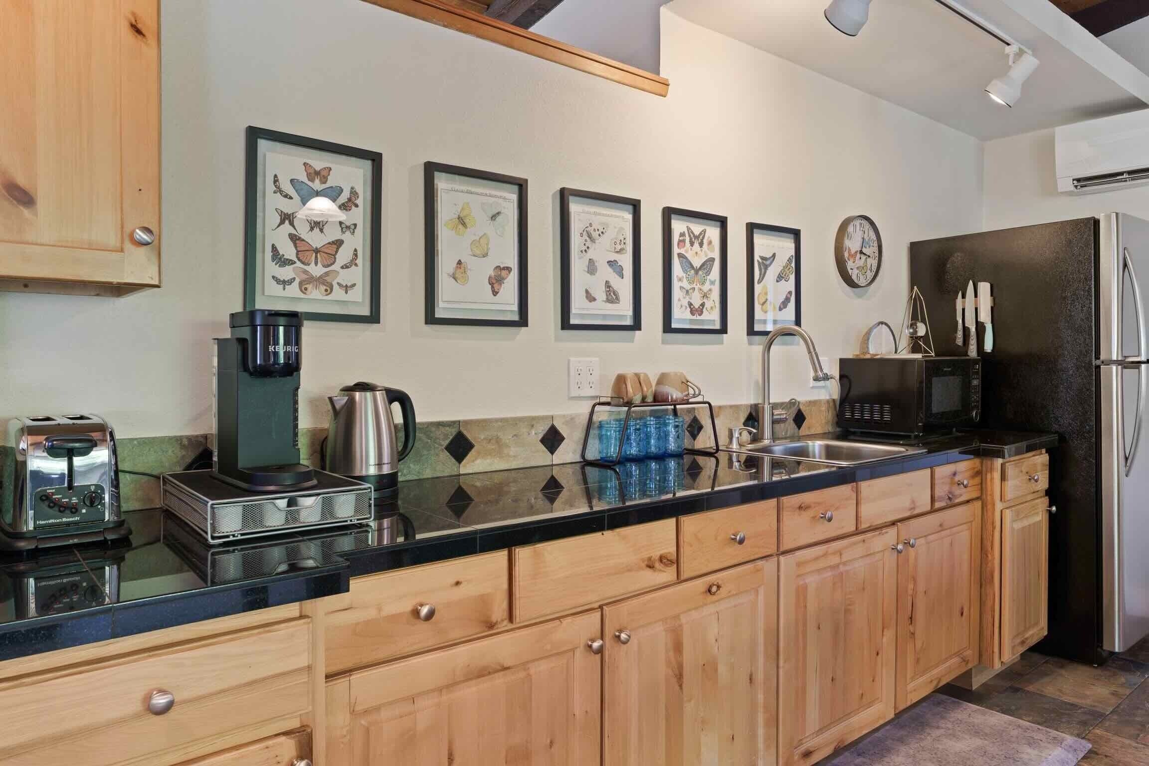 Coffee/tea maker, fridge, microwave, toaster
