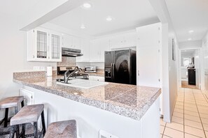 Fridge, microwave, oven, stovetop - Beach home with perfect location steps to sand & private hot tub (Newport Beach)