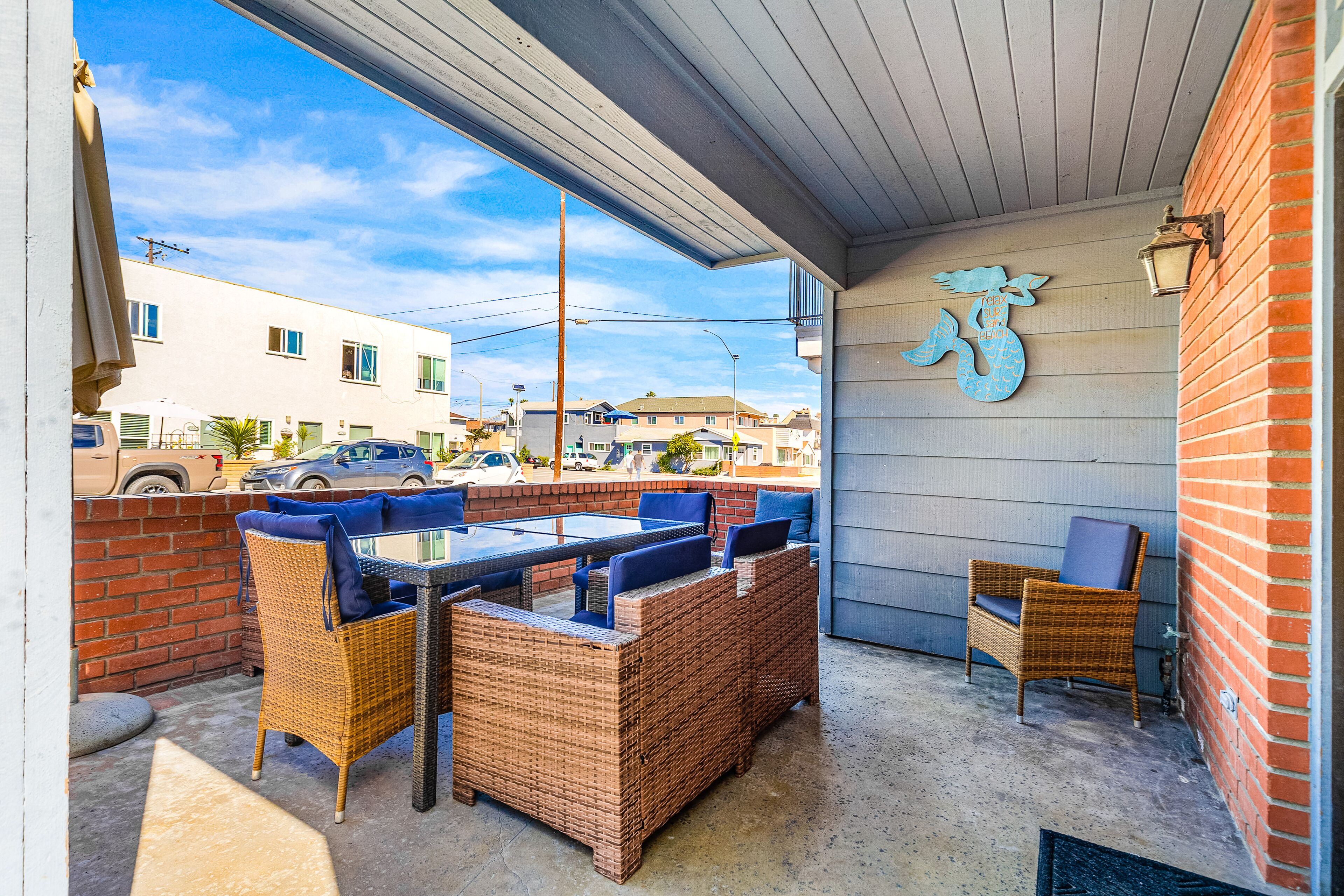 Beach home with private patio - steps to the beach and walk to everything
