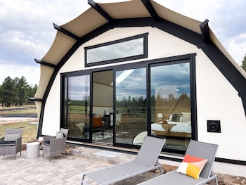 Premium bedding, down comforters, pillowtop beds, laptop workspace at Backland Glamping Resort - Grand Canyon