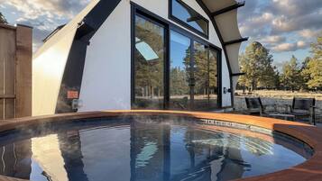 Premium bedding, down duvets, pillow-top beds, laptop workspace