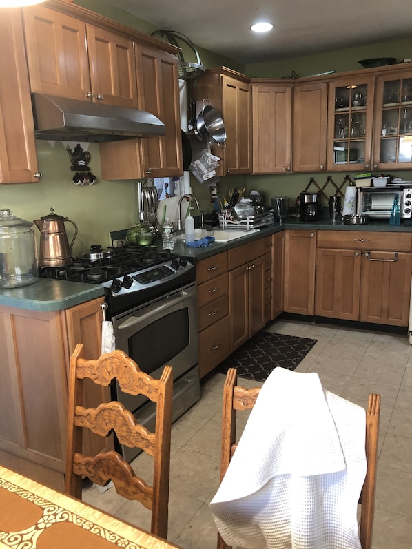 Microwave, toaster, blender, dining tables