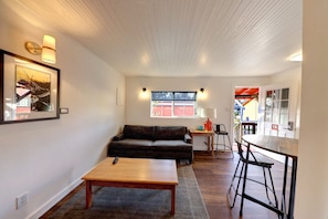 40-inch flat-screen TV with cable channels, TV, iPod dock