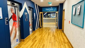 Desk, laptop workspace, blackout curtains, soundproofing