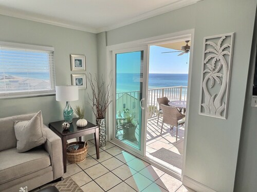 Stunning, renovated 3/2 condo on the beach, 2 large Ocean front pools. Sleeps 8