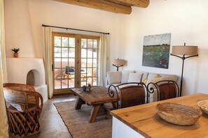 TV, fireplace, books