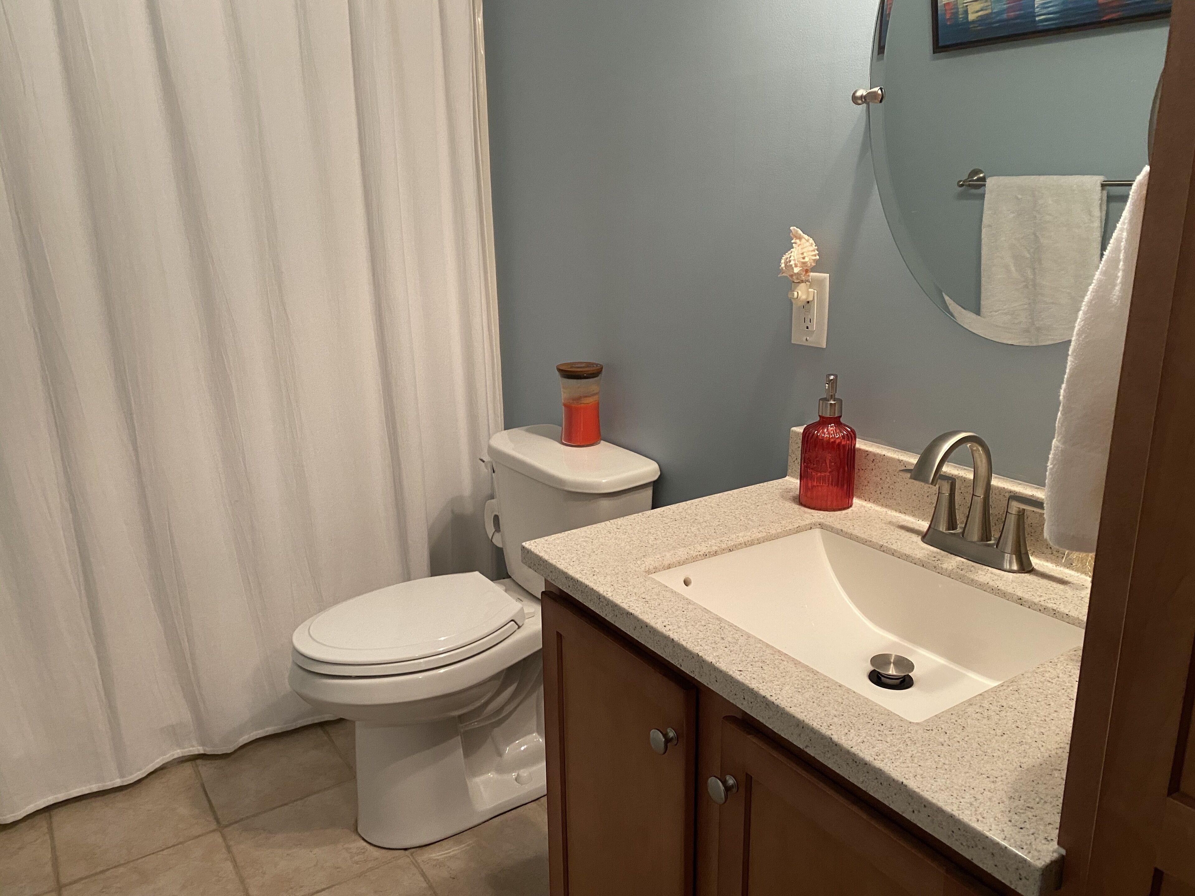 Combined shower/tub, hair dryer, towels, soap