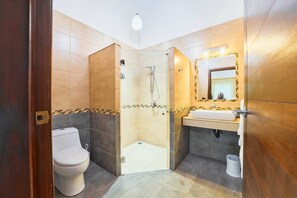 Shower, hair dryer, towels, soap