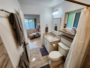 Shower, hair dryer, towels, soap