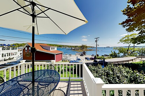All-suite Boothbay Harbor home with deck, ocean views, and fireplaces