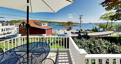 All-suite Boothbay Harbor home with deck, ocean views, and fireplaces