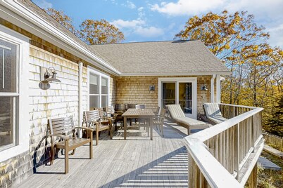 Woodland hideaway with lake access, private game room, fireplace, & luxe kitchen