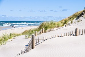 Guests can enjoy access to the beach from this property.
