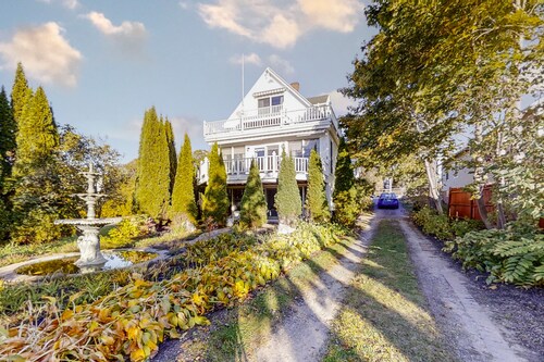 Oceanfront house with dock, kayaks, deck, and gas grill