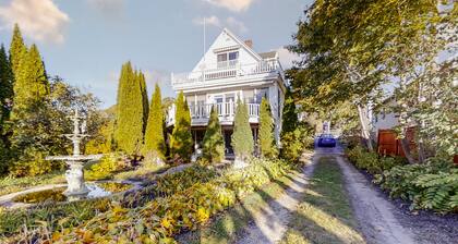 Oceanfront house with dock, kayaks, deck, and gas grill