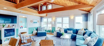 Dazzling ocean-view house with fireplace, deck, firepit, central AC, & W/D