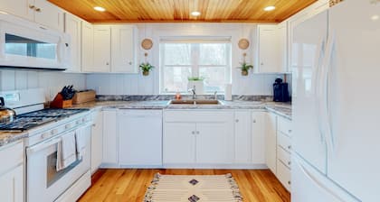 Dazzling ocean-view house with fireplace, deck, firepit, central AC, & W/D