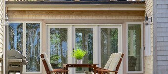 Striking Home with Scenic Marsh Views, Multiple Living Areas, Stroll to Bay