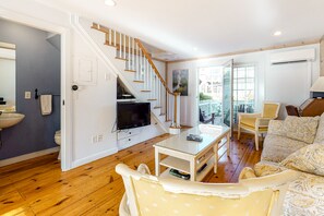 Flat-screen TV, DVD player, stereo, printers