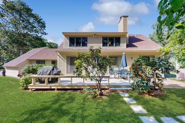 Terrace/patio - Stylish dog-friendly home near beaches & Fells Pond with huge deck & fireplace (Mashpee)