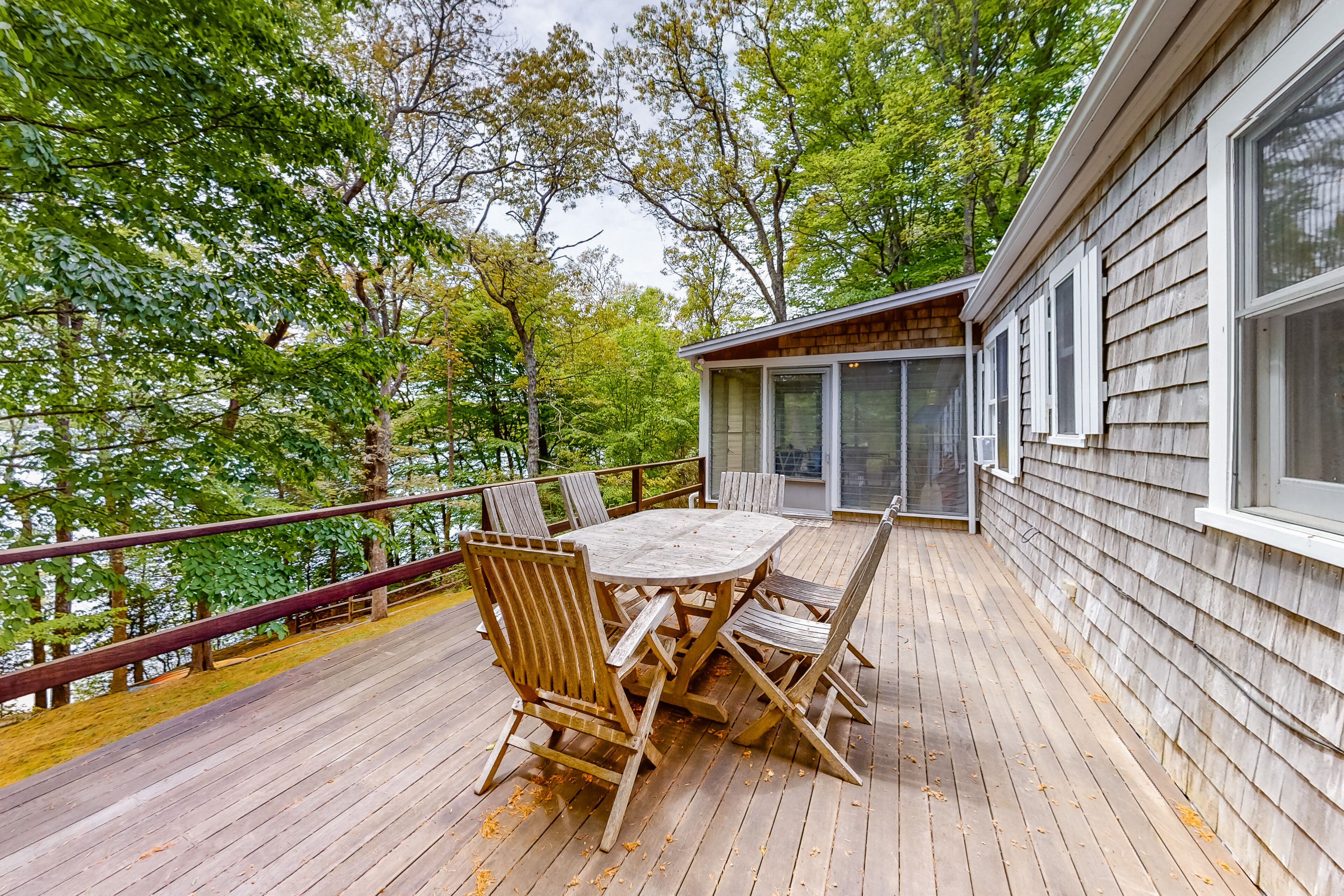 Lakefront cottage with WiFi, partial AC, private pier, patio, & deck - 2 dogs ok