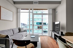 TV, stereo - Modern Bellevue 2BR w/ Gym, W/D & Roof Deck, near Downtown, by Blueground (Seattle)