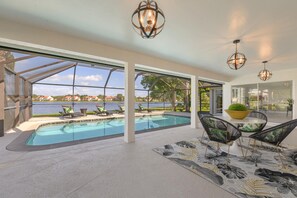 Outdoor pool, a heated pool - Luxury fully rehabed house with Lake View (Naples)