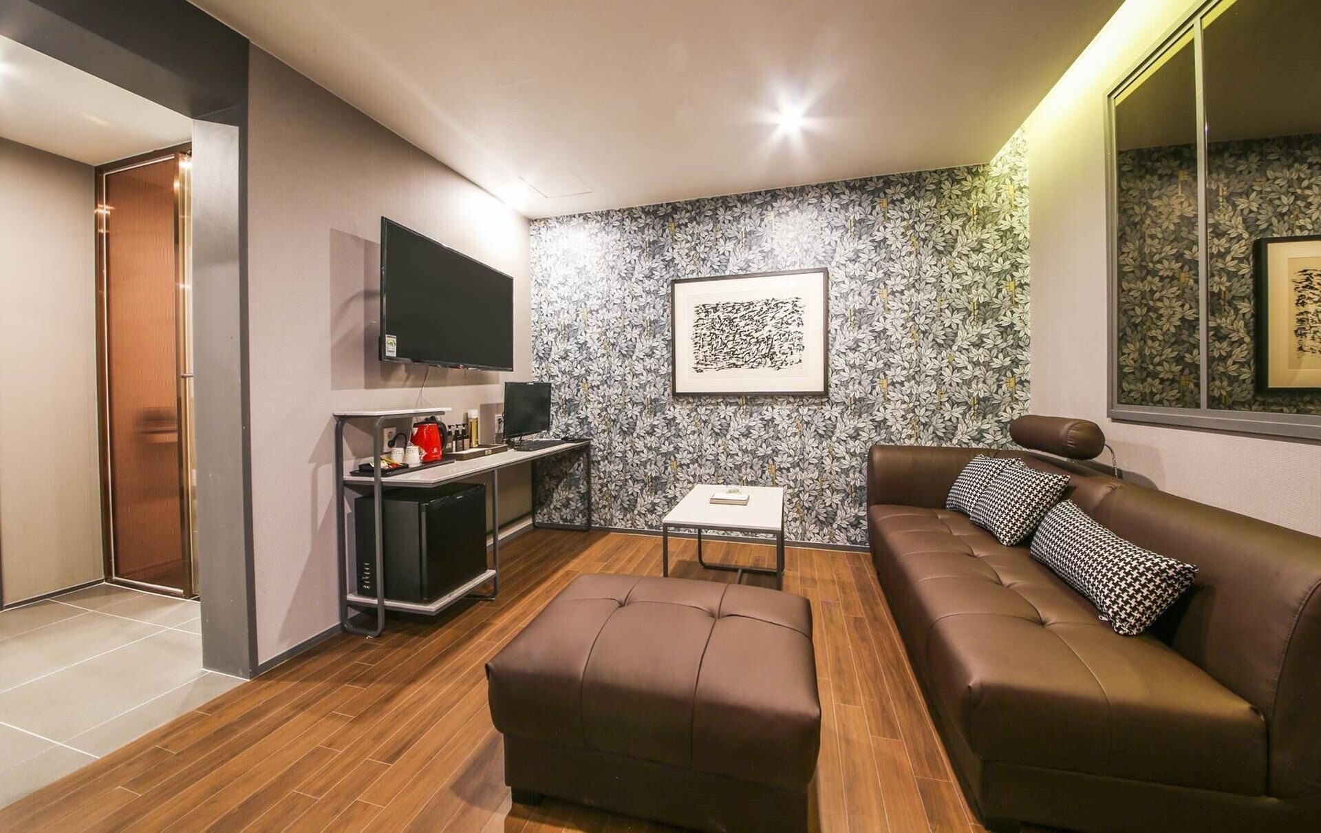 family twin room | living area | flat-screen tv, heated floors