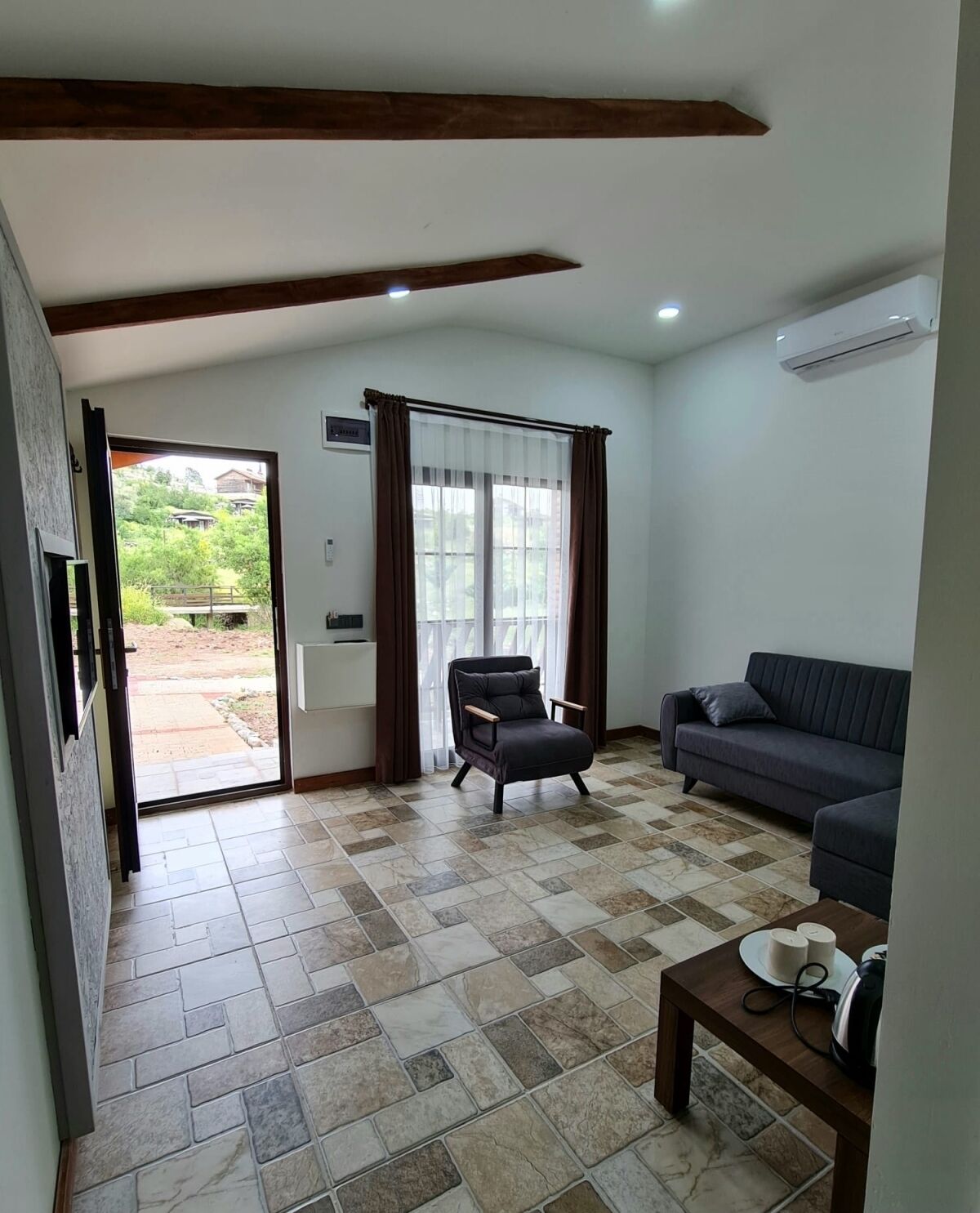 Family Room | Minibar, individually furnished, desk, bed sheets