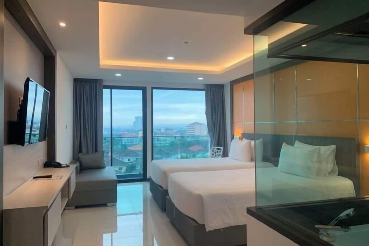 Free minibar items, in-room safe, desk, laptop workspace