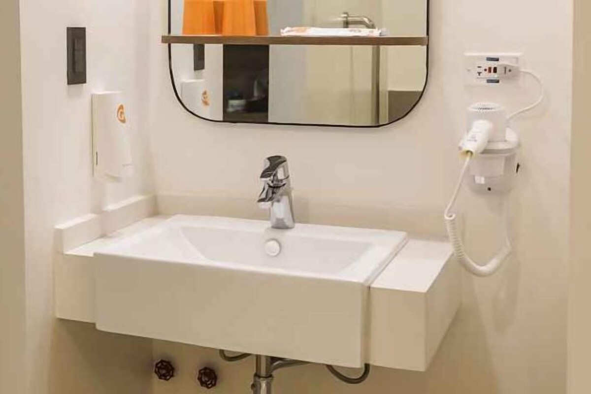 Shower, rainfall showerhead, towels, soap