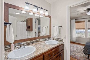 Bathtub, hair dryer, towels