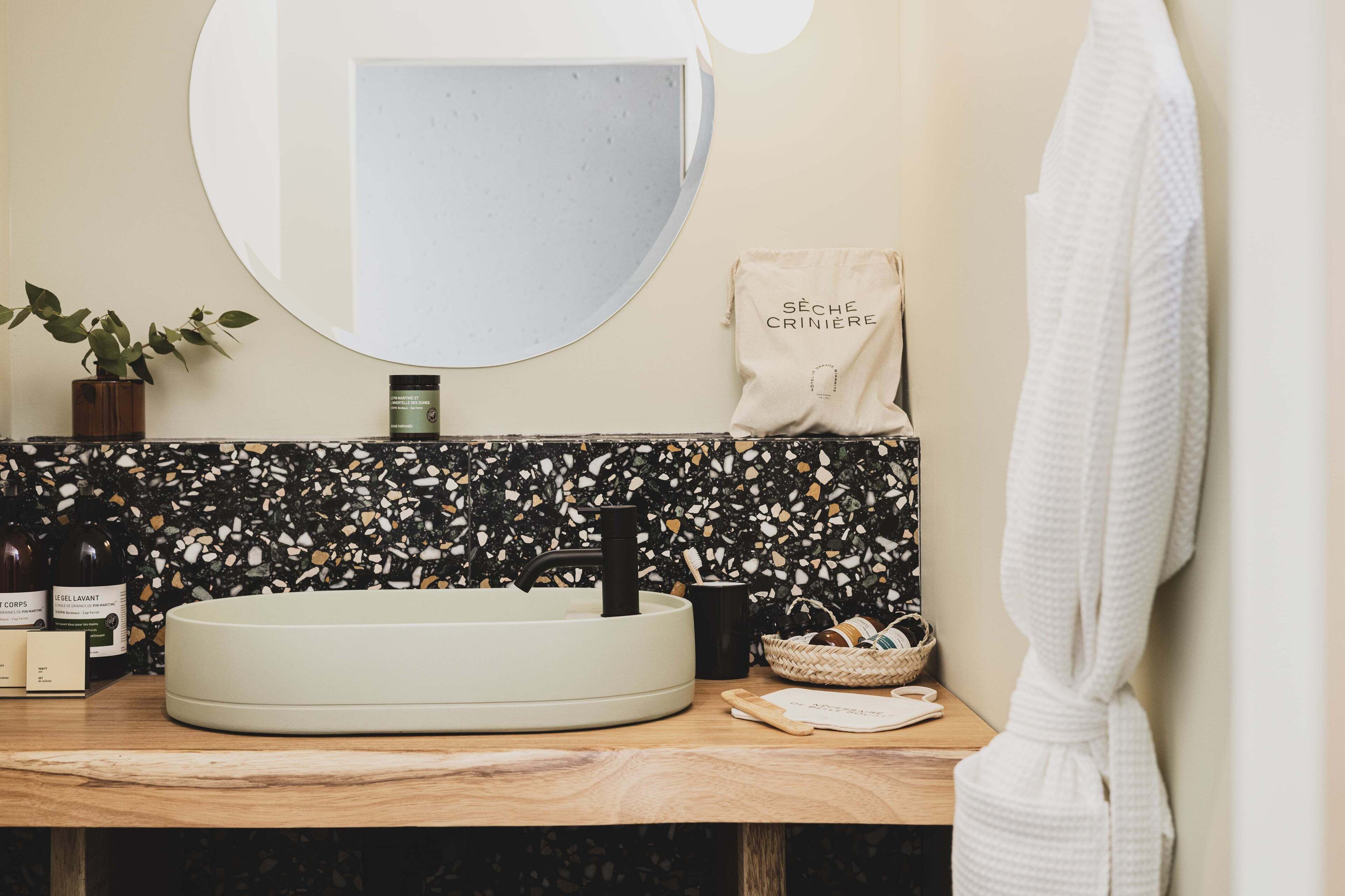 hair dryer, bathrobes, slippers, towels