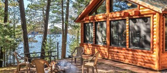 Private, log home on the sandy shore of Little Saint Germain Lake!