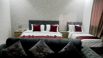 Blackout drapes, WiFi (free), bed sheets