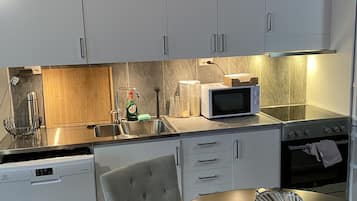 Apartment | Private kitchen | Fridge, microwave, oven, stovetop