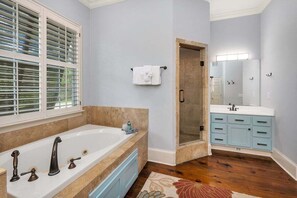 Shower, jetted tub, towels