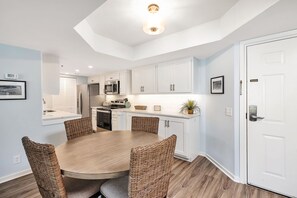Enjoy cooking in this well-equipped kitchen with appliances and a central island.