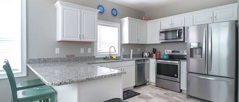 Coffee/tea maker, fridge, microwave, oven