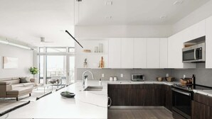 Coffee/tea maker, fridge, microwave, oven - Modern Penthouse | Private Skyline Balcony (Denver)